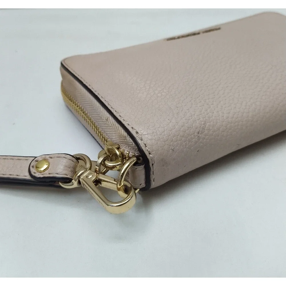Michael Kors Light Pink Pebbled Leather Zip Around Credit Card ID Window Wallet